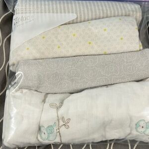 2 bags of receiving blankets. No animals or smoking, organic laundry detergent.